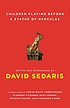 Children playing before a statue of Hercules de David Sedaris