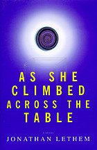 As she climbed across the table