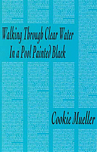 Walking through clear water in a pool painted black