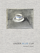 Under blue cup